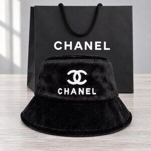 CHANEL Black Shearling Logo Bucket Hat
